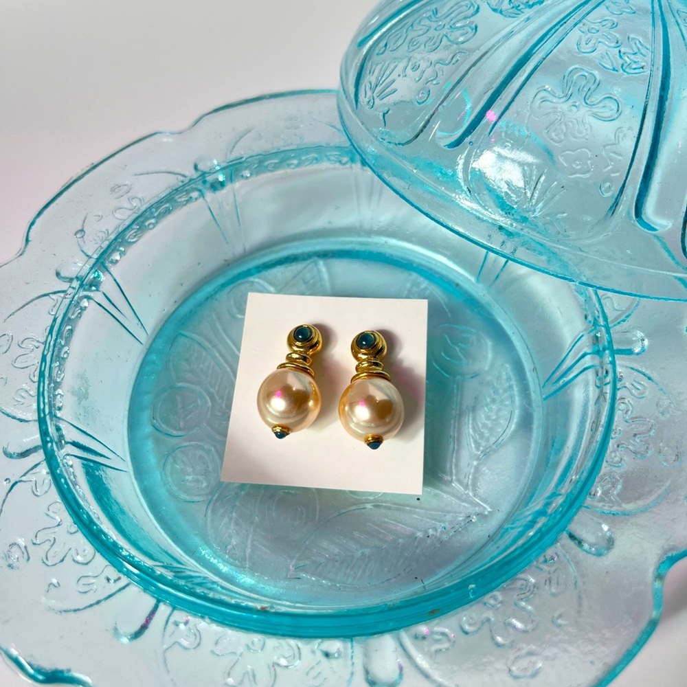 Gold toned faux pearl earrings